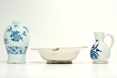 A blue and white French faience shaving bowl, a chinoiserie vase and a jug, Nevers and Moustiers, 17/18th C.