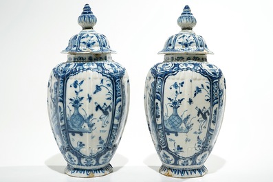 A pair of Dutch Delft blue and white chinoiserie covered vases, 18th C.