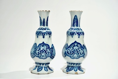 A pair of Dutch Delft blue and white vases, 17th C.