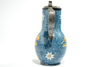 A large blue ground Brussels faience jug with a hen and a cockerel, 18/19th C.