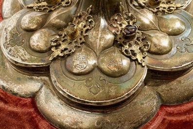 A gilt silver monstrance with inlaid semi-precious stones, dated 1614