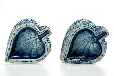 A pair of Dutch Delft blue and white heart-shaped salts, 17/18th C.