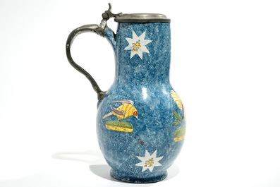 A large blue ground Brussels faience jug with a hen and a cockerel, 18/19th C.