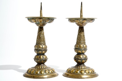 A pair of brass pricket candlesticks, 17th C.