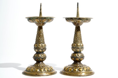 A pair of brass pricket candlesticks, 17th C.