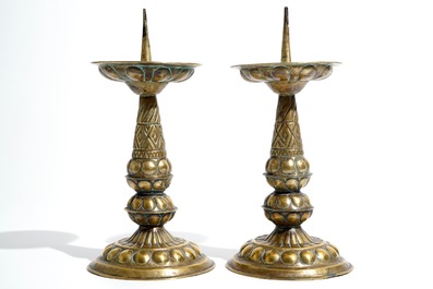 A pair of brass pricket candlesticks, 17th C.