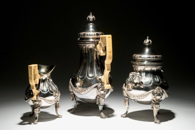 Une cafeti&egrave;re et un cremier aux anses en ivoire et un pot &agrave; sucre en argent, style Louis XVI, marques de J. Roelandts, Gand, 1779