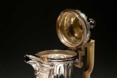 A Louis XVI silver coffeepot and milk jug with ivory handles and a sugar pot, marked for J. Roelandts, Ghent, 1779