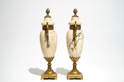 Two silver pheasants, a table bell and a pair of marble urns and covers, 19/20th C.