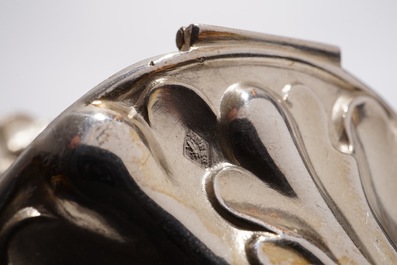 Three silver mustard jars with blue cristal interiors, 19th C.