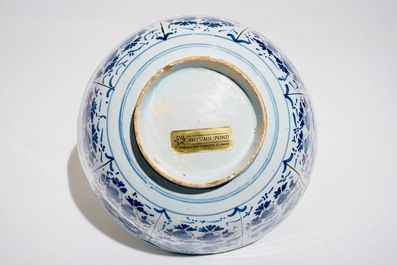 A large Dutch Delft blue and white floral bowl, 18th C.