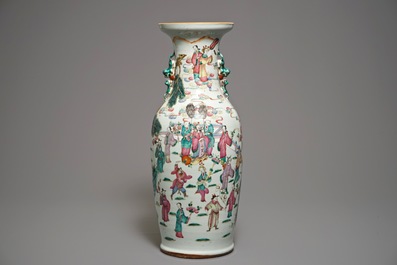 A Chinese famille rose vase with circular court scene design, 19th C.