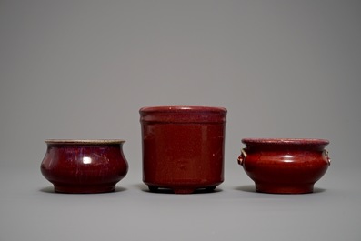 Two Chinese oxblood-glazed incense burners and a brush pot, 19/20th C.