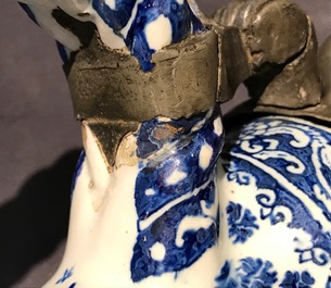 An attractive Dutch Delft blue and white gadrooned pewter-mounted jug, 2nd half 17th C.