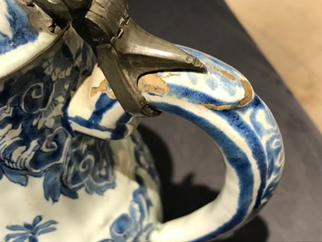 A Dutch Delft blue and white jug and cover with pewter mount, 18th C.