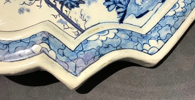 A Dutch Delft blue and white chinoiserie plaque with an elephant, 18th C.