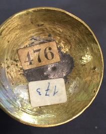 A bronze holy water bucket and four miniature candlesticks, 16/17th C. and later