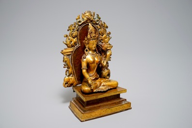 A Sino-Tibetan gilt bronze and copper alloy figure of White Tara, 19/20th C.