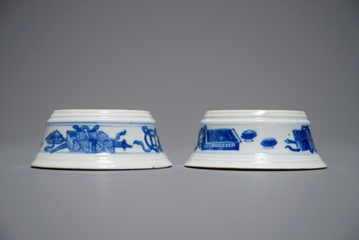 A pair of round Chinese blue and white salts with antiquities design, Kangxi