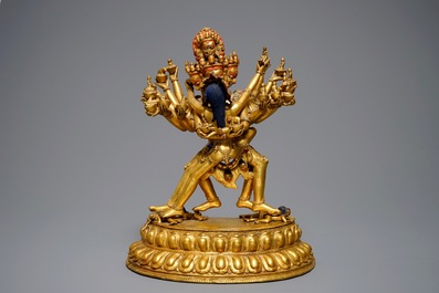 A large Sino-Tibetan gilt bronze figure of Kapaladhara Hevajra, 17/18th C.