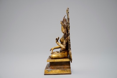 A Sino-Tibetan gilt bronze and copper alloy figure of White Tara, 19/20th C.