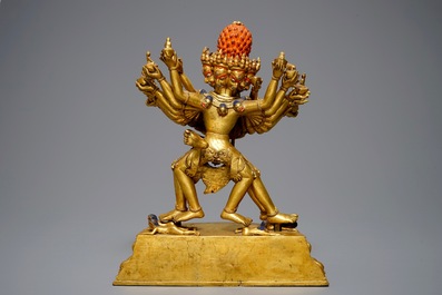 A large Sino-Tibetan gilt bronze figure of Kapaladhara Hevajra, 17/18th C.