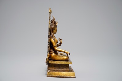 A Sino-Tibetan gilt bronze and copper alloy figure of White Tara, 19/20th C.