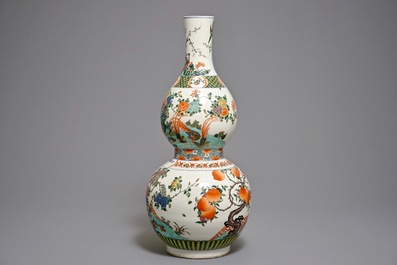 A large Chinese famille verte double gourd vase, inscribed Kangxi, 20th C.
