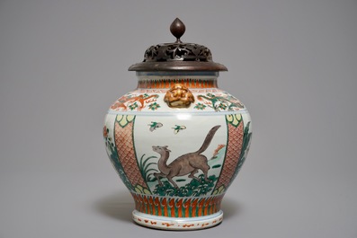A Chinese wucai vase with mythical beasts, 19th C.
