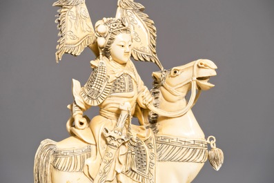 A pair of Chinese carved ivory horseriders, 19th C.