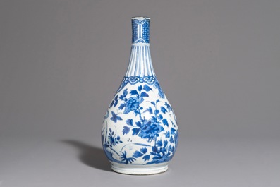 A fine Chinese blue and white bottle vase with a phoenix, hare mark, Wanli