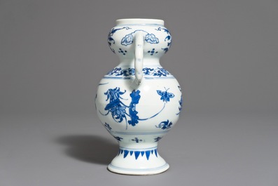 A Chinese blue and white elephant handle vase, Transitional period