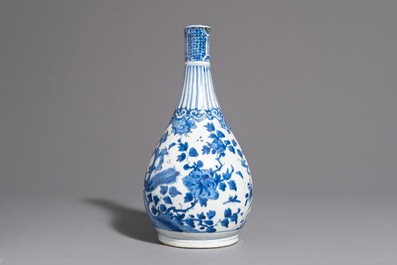 A fine Chinese blue and white bottle vase with a phoenix, hare mark, Wanli