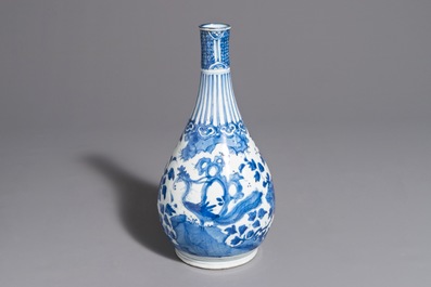 A fine Chinese blue and white bottle vase with a phoenix, hare mark, Wanli