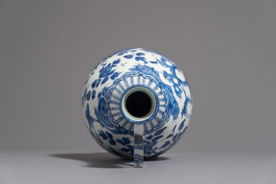 A fine Chinese blue and white bottle vase with a phoenix, hare mark, Wanli