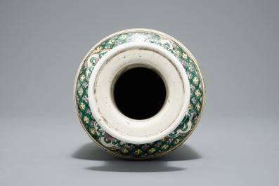 A Chinese verte biscuit rouleau vase, Kangxi or later