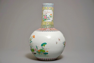 A Chinese famille rose tianqiu ping vase with birds among foliage, Qianlong mark, 20th C.