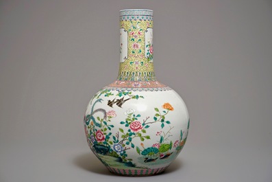 A Chinese famille rose tianqiu ping vase with birds among foliage, Qianlong mark, 20th C.