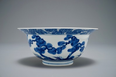 A Chinese blue and white klapmuts bowl with a tiger fighting a dragon, Chenghua mark, Kangxi