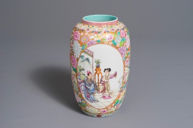 A Chinese famille rose millefleurs vase with figurative medallions, 20th C.