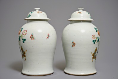 A pair of Chinese famille rose covered vases with boys among pumpkin vines, 19th C.