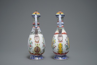 Two Chinese Canton enamel ewers and covers, Qianlong