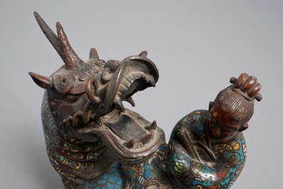 A Chinese bronze and cloisonn&eacute; incense burner shaped as a sage on a qilin, seal mark, 19th C.