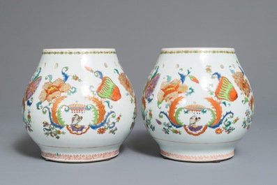 A pair of Chinese famille rose 'Pompadour' pot-pourri jars, Qianlong, ca. 1745