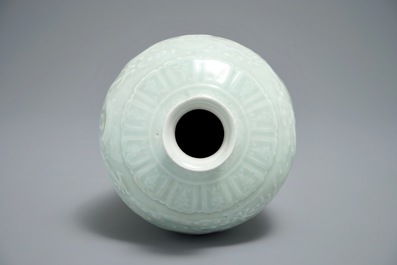 A Chinese celadon meiping vase with underglaze design of dragons, Qianlong mark, 19/20th C.
