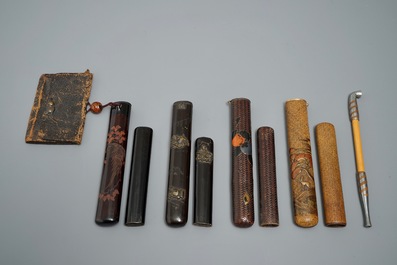 Four Japanese kiseru or tobacco pipe cases, a pipe and a pouch, Meiji, 19th C.