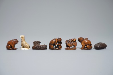 Seven Japanese carved wood and ivory netsuke and okimono, Japan, Meiji, 19/20th C.
