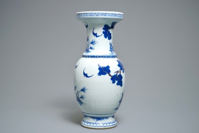 A Chinese blue, white and iron red vase with deer, 19/20th C.