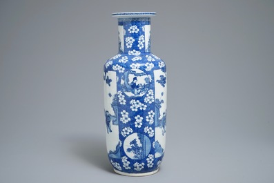 A Chinese blue and white rouleau vase with prunus on cracked ice, 19th C.