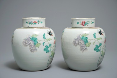 A pair of Chinese famille rose jars and covers with insects and flowers, Qianlong mark, 19/20th C.